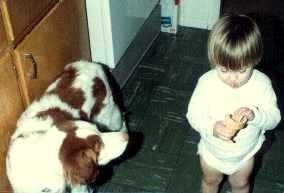 Dog and baby with ice cream cone